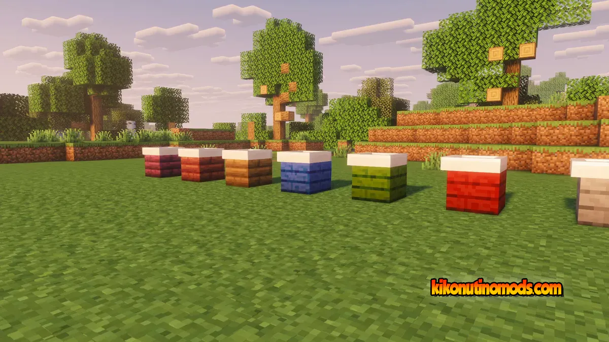 Fila de fregaderos de cocina de colores variados sobre césped, con shaders