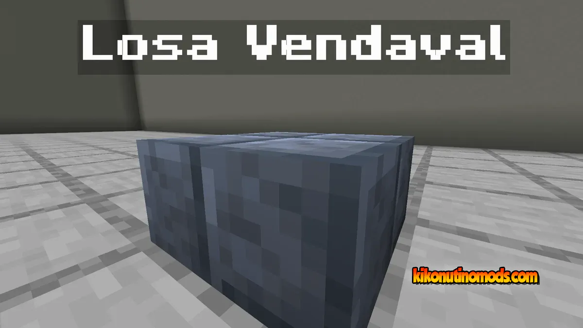 «Losa Vendaval»: Bloque en forma de losa con textura azul grisácea sobre un suelo de baldosas grises.